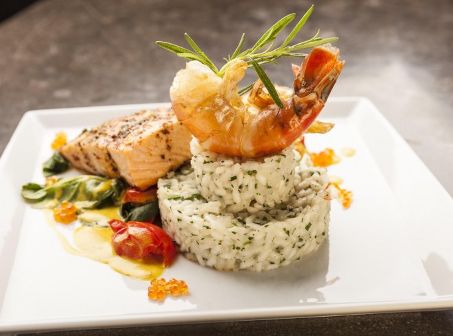 Rice with salmon fillet and grilled shrimp Hotel Gams Beilngries